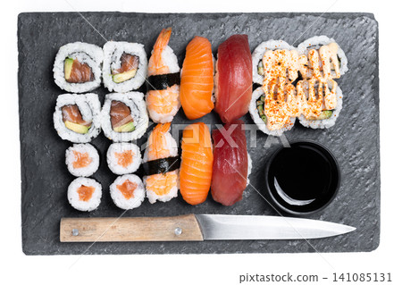 Assorted sushi platter with nigiri and maki rolls Assorted sushi platter with nigiri and maki rolls 141085131
