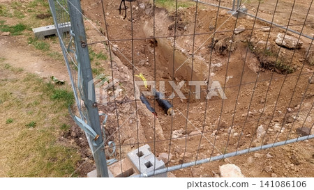 Construction Trench with Pipes 141086106