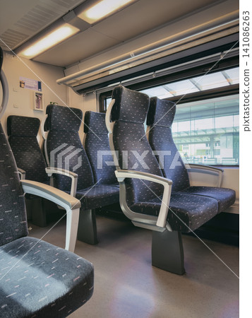 Empty Passenger Seats Inside a Modern Train Carriage Empty Passenger Seats Inside a Modern Train Carriage 141086263