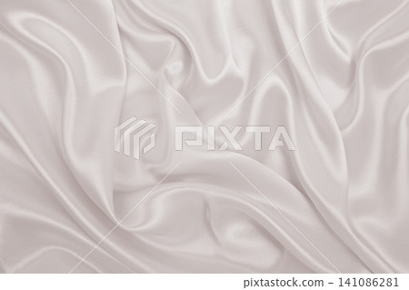 Smooth elegant golden silk or satin luxury cloth texture as wedding background. Luxurious background design. In Sepia toned. Retro style Smooth elegant golden silk or satin luxury cloth texture as wedding background. Luxurious background design. In Sepia toned. Retro style 141086281