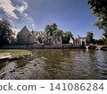 Scenic View of Minnewater Lake and Historic Buildings in Bruges 141086284