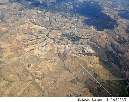 sicily farmed fields while landing at catania airport aerial view panorama 141086585