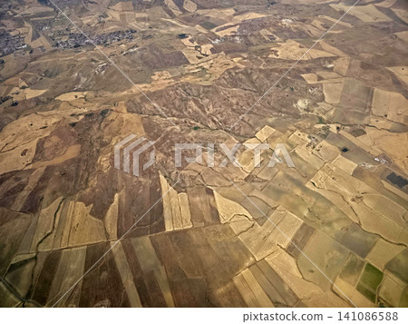 sicily farmed fields while landing at catania airport aerial view panorama sicily farmed fields while landing at catania airport aerial view panorama 141086588