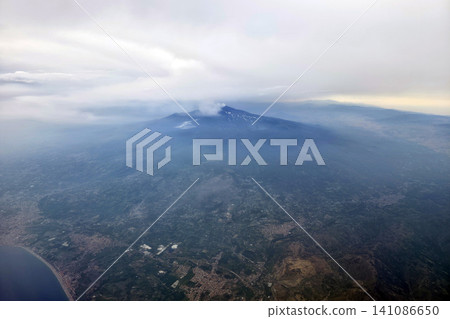 Etna volcano erupting aerial view from airplane 141086650