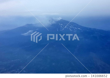 Etna volcano erupting aerial view from airplane 141086652