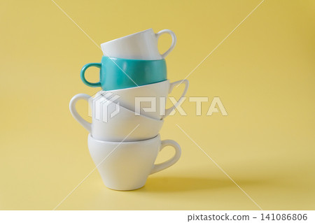 A stack of coffee cup on background.Food and drink. A stack of coffee cup on background.Food and drink. 141086806
