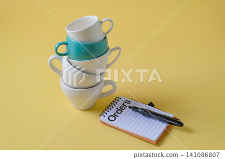 A stack of coffee cup on background.Food and drink. A stack of coffee cup on background.Food and drink. 141086807