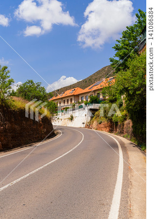 Winding Mountain Road Through Spanish Village Near Valencia Spain Winding Mountain Road Through Spanish Village Near Valencia Spain 141086884