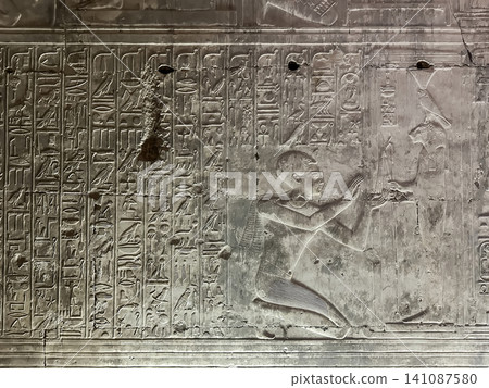 Beautiful bas-reliefs and ancient hieroglyphs in the Temple of Seti I in Abydos, Egypt. Beautiful bas-reliefs and ancient hieroglyphs in the Temple of Seti I in Abydos, Egypt. 141087580