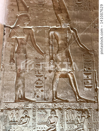 Beautiful bas-reliefs and ancient hieroglyphs in the Temple of Seti I in Abydos, Egypt. Beautiful bas-reliefs and ancient hieroglyphs in the Temple of Seti I in Abydos, Egypt. 141087629