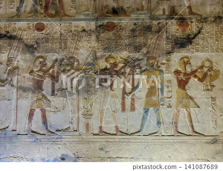 Beautiful bas-reliefs and ancient hieroglyphs in the Temple of Seti I in Abydos, Egypt. Beautiful bas-reliefs and ancient hieroglyphs in the Temple of Seti I in Abydos, Egypt. 141087689