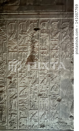 Beautiful bas-reliefs and ancient hieroglyphs in the Temple of Seti I in Abydos, Egypt. 141087769