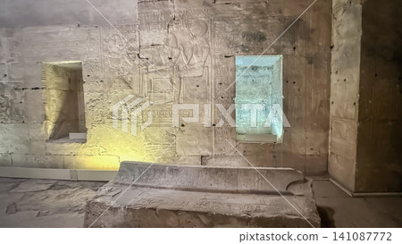 Beautiful bas-reliefs and ancient hieroglyphs in the Temple of Seti I in Abydos, Egypt. 141087772