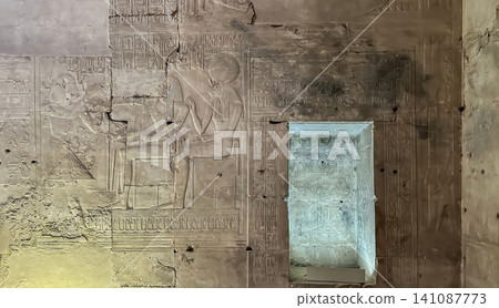 Beautiful bas-reliefs and ancient hieroglyphs in the Temple of Seti I in Abydos, Egypt. Beautiful bas-reliefs and ancient hieroglyphs in the Temple of Seti I in Abydos, Egypt. 141087773