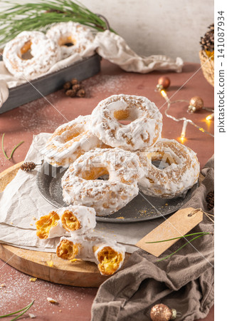 Portuguese sweets named argolas das Caldas - Rings from Caldas. Typical glazed cookies with sugar. Regional sweet from Caldas da Rainha, Portugal. Portuguese sweets named argolas das Caldas - Rings from Caldas. Typical glazed cookies with sugar. Regional sweet from Caldas da Rainha, Portugal. 141087934