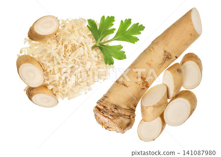 Horseradish root with slices grated pile and parsley isolated on white background. Top view. Flat lay. Horseradish root with slices grated pile and parsley isolated on white background. Top view. Flat lay. 141087980
