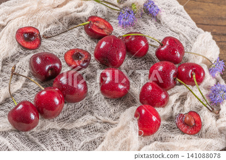 Fresh ripe cherries. Sweet cherries on table Fresh ripe cherries. Sweet cherries on table 141088078
