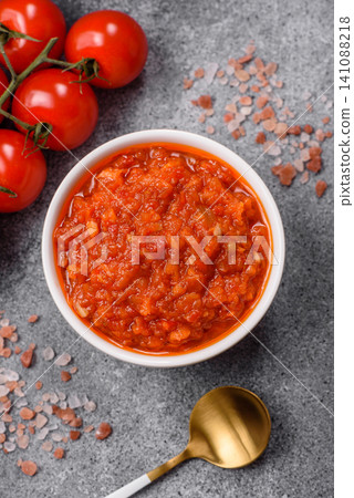 Red tomato Bolognese sauce with spices, salt, pepper, and herbs. A red sauce 141088218
