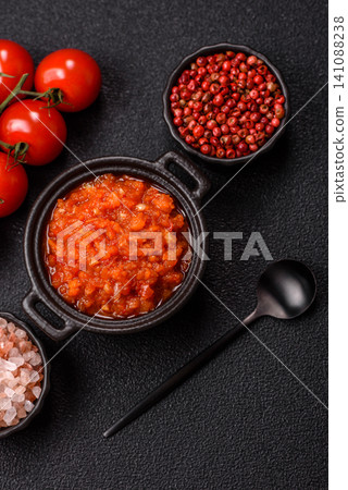 Red tomato Bolognese sauce with spices, salt, pepper, and herbs. A red sauce 141088238