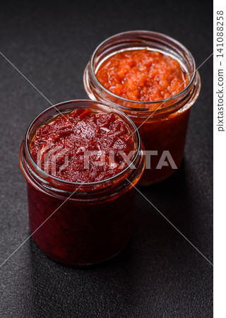 Grated beetroot with salt and spices as an ingredient for borscht or a vegan salad. Grated beetroot 141088258