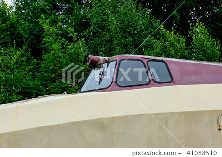 Close up of front cockpit window of a retro vintage train 141088510
