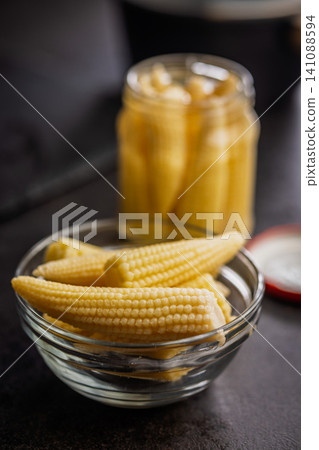 Baby Corn In Glass Bowl And Jar Preserved Canned Vegetable Ingredient For Cooking Baby Corn In Glass Bowl And Jar Preserved Canned Vegetable Ingredient For Cooking 141088594