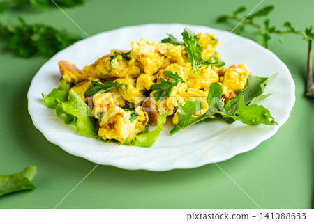 homemade scrambled eggs with fresh greens for breakfast homemade scrambled eggs with fresh greens for breakfast 141088633
