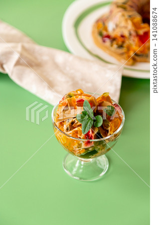 colorful gelatin dessert with coffee and fruit served in elegant glass colorful gelatin dessert with coffee and fruit served in elegant glass 141088674