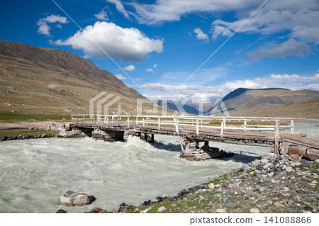 Wooden bridge over the White river, Altai Tavan Bogd National Park, Mongolia Wooden bridge over the White river, Altai Tavan Bogd National Park, Mongolia 141088866