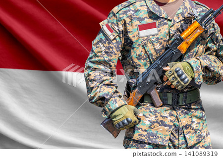 Indonesia flag with soldier holding assault rifle Indonesia flag with soldier holding assault rifle 141089319