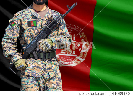Afghanistan flag with soldier holding assault rifle Afghanistan flag with soldier holding assault rifle 141089320