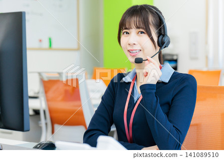 Image of a female call center operator 141089510