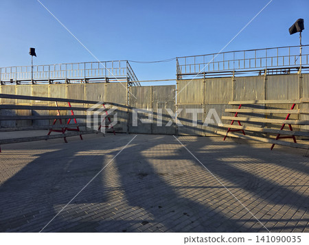 Barriers and benches are set up in the arena for the Bulls in the Sea festival in Denia. Spectators will gather soon to enjoy the traditional event that features bulls in the sea. Barriers and benches are set up in the arena for the Bulls in the Sea festival in Denia. Spectators will gather soon to enjoy the traditional event that features bulls in the sea. 141090035