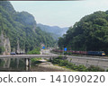 A freight train pulled by EF64-1045 powerfully speeds along the Hakubi Line with the magnificent Ikura Gorge as a backdrop. (Photographed on June 19, 2026) A freight train pulled by EF64-1045 powerfully speeds along the Hakubi Line with the magnificent Ikura Gorge as a backdrop. (Photographed on June 19, 2026) 141090220