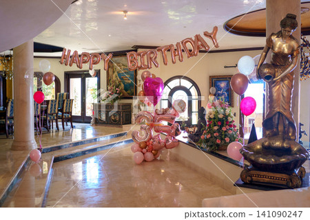Luxury interior with birthday balloons and floral arrangements Luxury interior with birthday balloons and floral arrangements 141090247
