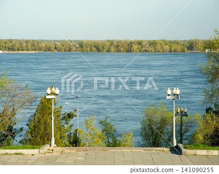 Volga River landscape with waterfront promenade in Volgograd Volga River landscape with waterfront promenade in Volgograd 141090255