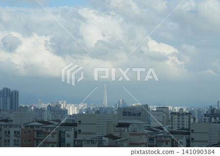 Urban cityscape and residential area view on a bright day Urban cityscape and residential area view on a bright day 141090384