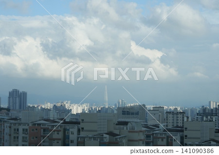 Urban cityscape and residential area view on a bright day Urban cityscape and residential area view on a bright day 141090386