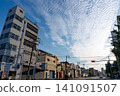 Cirrocumulus clouds and cityscape 141091507