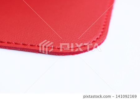 shiny red leather texture isolated on white background shiny red leather texture isolated on white background 141092169