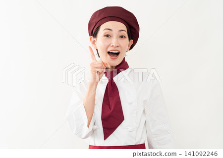 一位身穿麵包師制服的女子 一位身穿麵包師制服的女子 141092246