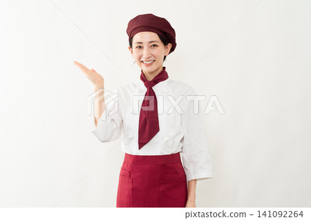 一位身穿麵包師制服的女子 一位身穿麵包師制服的女子 141092264