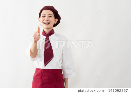 一位身穿麵包師制服的女子 一位身穿麵包師制服的女子 141092267