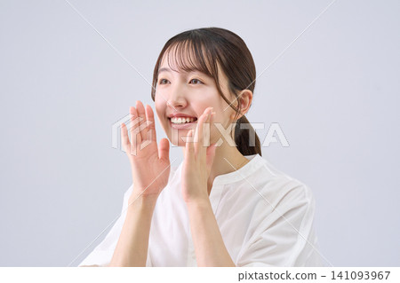 A young woman posing in support A young woman posing in support 141093967