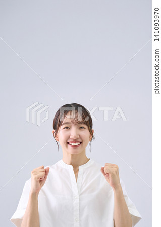 A young woman posing in support A young woman posing in support 141093970