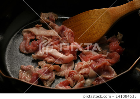 Pork being fried Pork being fried 141094533