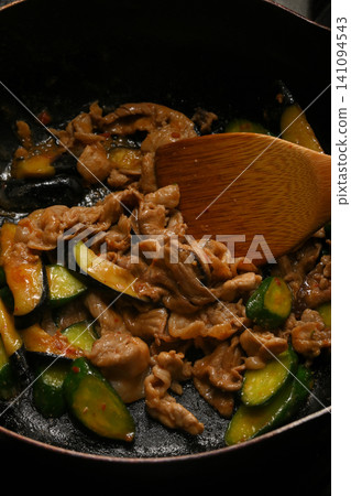 Cooking scene of stir-fried eggplant, cucumber, and pork with spicy miso Cooking scene of stir-fried eggplant, cucumber, and pork with spicy miso 141094543