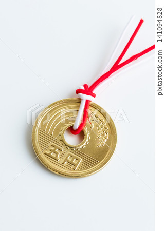 Good fortune, matchmaking, a five-yen coin with a red string Good fortune, matchmaking, a five-yen coin with a red string 141094828
