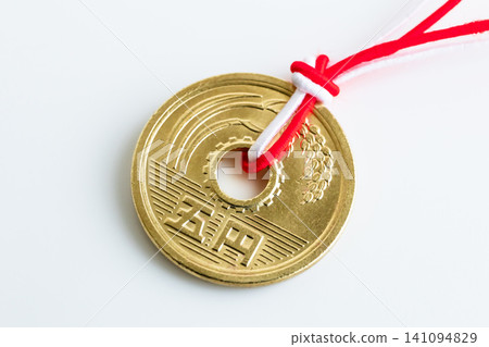 Good fortune, matchmaking, a five-yen coin with a red string Good fortune, matchmaking, a five-yen coin with a red string 141094829