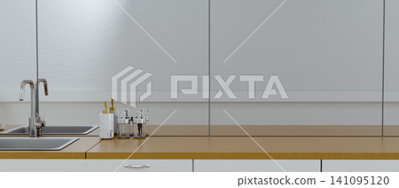 kitchen counter top with modern sink and dispensers 141095120